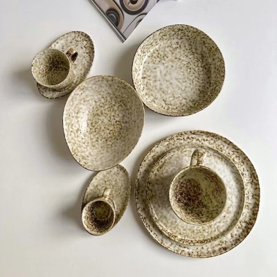 Set of six ribbed ceramic cups in pastel shades